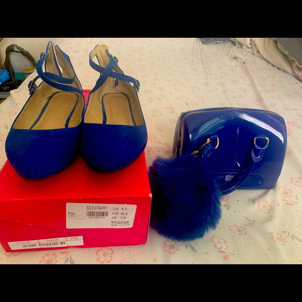 Royal blue flats in bag